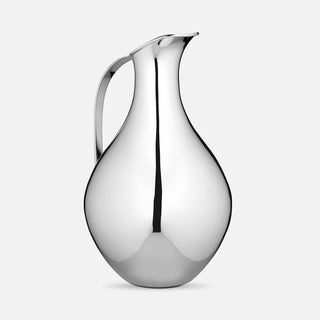 Sterling Silver bellied jug featuring a curved handle and a stylish polished finish.