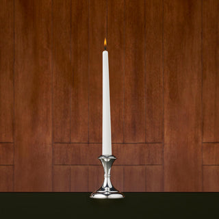 Contemporary, medium candlestick featuring stylish polish. To accommodate one candle only. 21cm tall. 