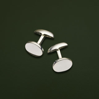 Sterling Silver oval polished cufflinks with articulated fitting. Can be personalised with engraving. 