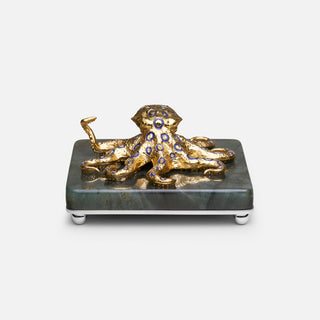 
Sterling silver Blue Ringed Octopus sculpture with blue enamel, yellow gold plating and sapphire eyes, mounted on a labradorite stone base.