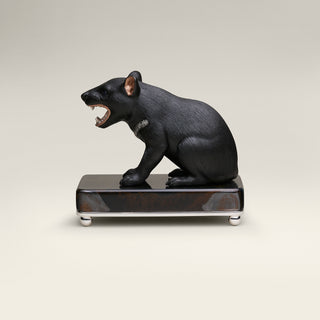 Sterling silver Tasmanian Devil sculpture on a blue tiger’s eye stone base.