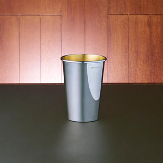 Australian Sterling Silver straight-edge beaker featuring a high polished outside and matte gold-plated interior. 