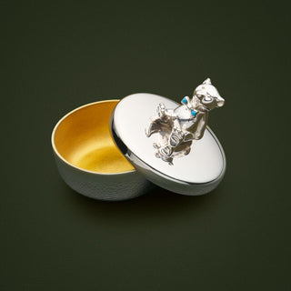 Sterling Silver Tooth Box featuring teddy bear with blue enamel bow. Polished exterior with matt gold-plate interior.