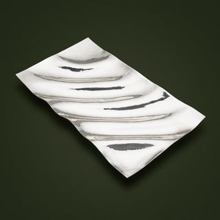 Sterling Silver rectangular tray featured a wave pattern and hammered surface texture. 